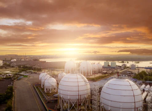 Industrial gas tanks in factories. LNG or liquefied gas storage. Global energy crisis. Energy crisis. Natural gas storage industry. Above-ground gas storage tank.